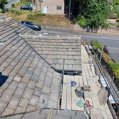 a view of the roof of a house in the middle of the day